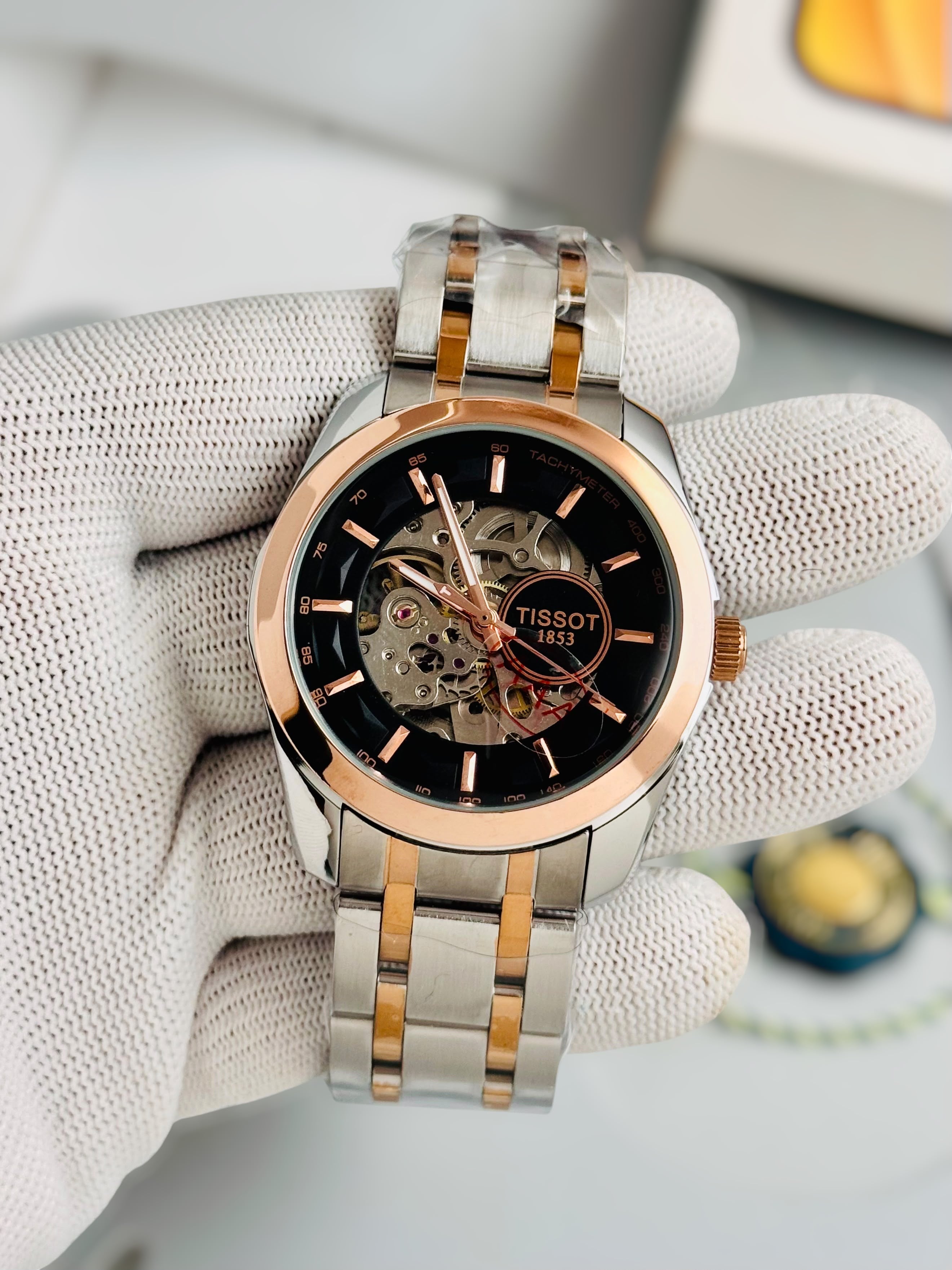 TISSOT 1853 Skeleton Automatic – Black Dial Rose Gold Two-Tone Stainless Steel Watch